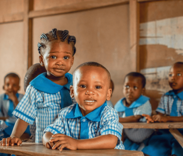 kids wearing a uniform that is scotch blue in the classroom
